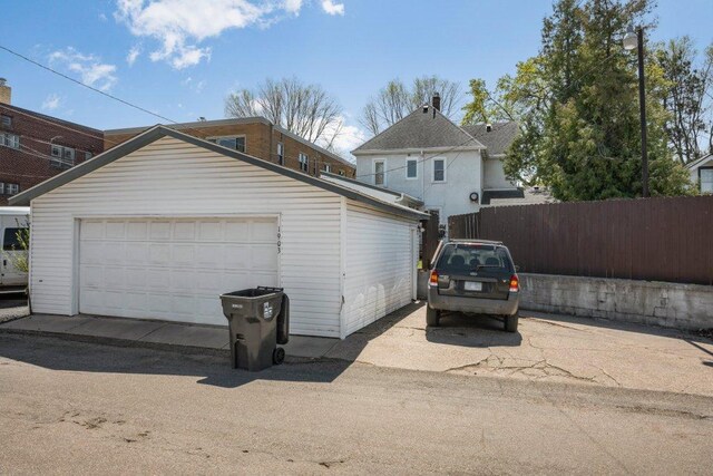 detached garage with fence