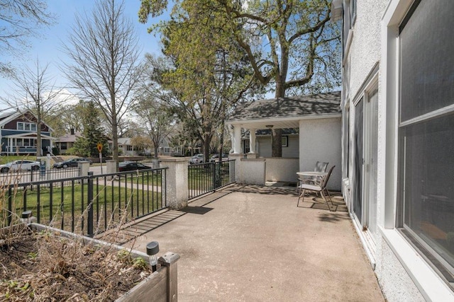 view of patio featuring a residential view and covered porch