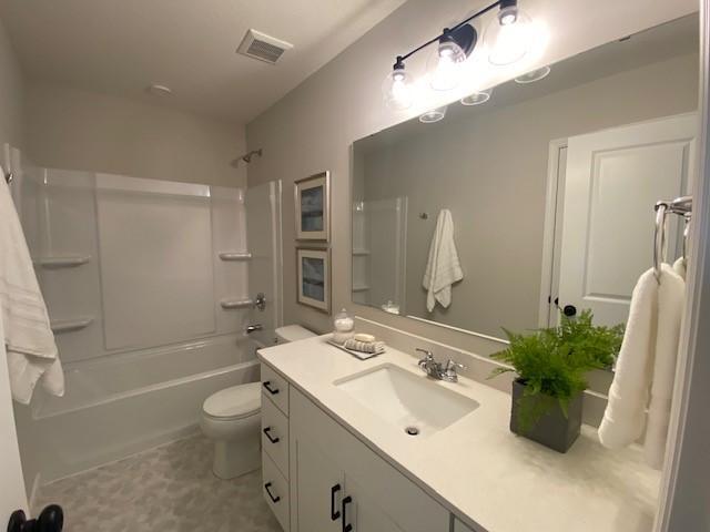 14570 Kingsview Ln N, Dayton, MN 55327 - bathroom with vanity and bathtub / shower combination