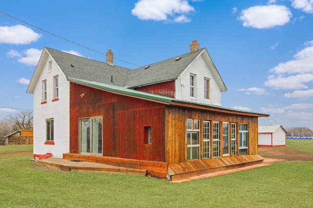 18848 223rd St, Richmond, MN 56368 - back of house with a chimney and a yard