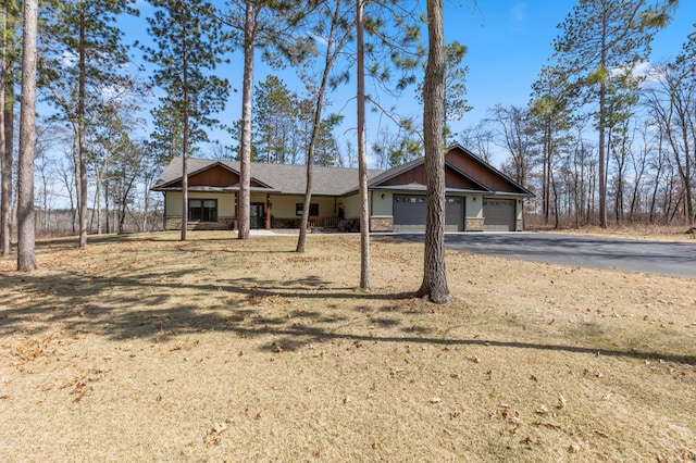 16605 Piper Ln, Brainerd, MN 56401 - view of front of home with a garage and asphalt driveway