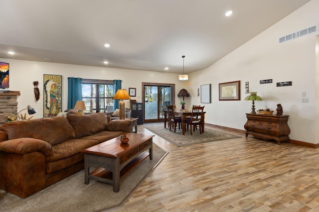 16605 Piper Ln, Brainerd, MN 56401 - living area with recessed lighting, light wood-style flooring, baseboards, and vaulted ceiling
