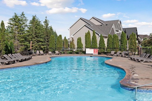 17607 64th Pl N, Maple Grove, MN 55311 - community pool with a patio area