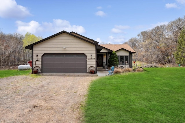 ranch-style home featuring a garage, dirt driveway, and a front lawn