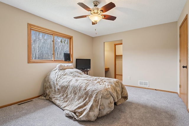 bedroom featuring carpet floors, baseboards, and visible vents