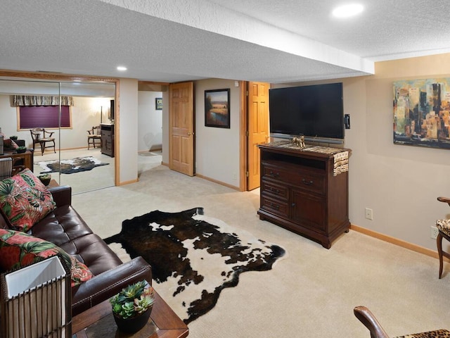living area featuring light colored carpet, baseboards, a textured ceiling, and recessed lighting