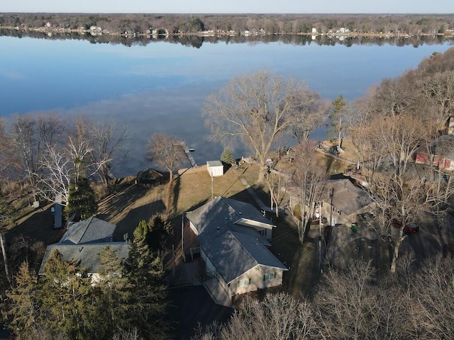 aerial view of property's location featuring a large body of water