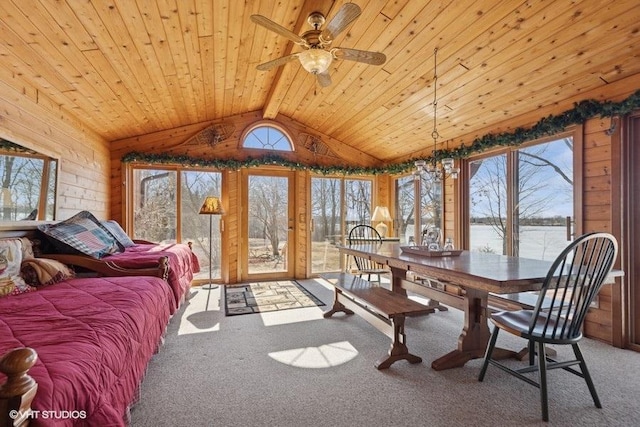sunroom featuring beamed ceiling