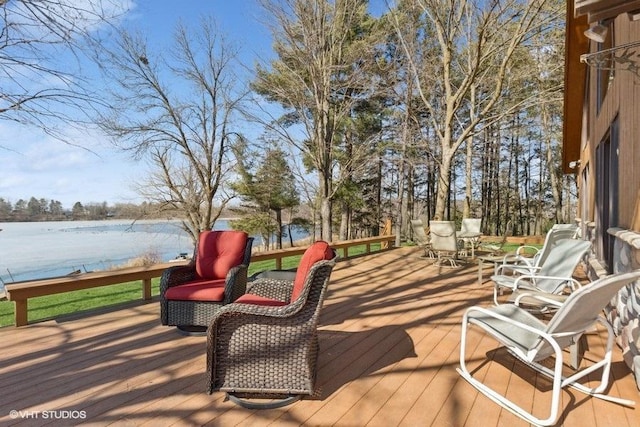 deck featuring a water view