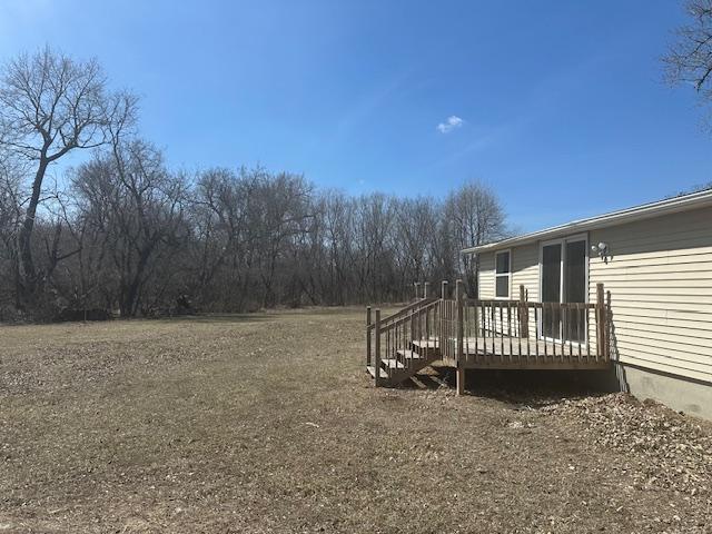 482 US Highway 12, Ortonville, MN 56278 - view of yard with a deck