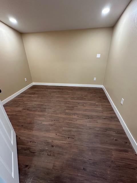 482 US Highway 12, Ortonville, MN 56278 - empty room with baseboards, dark wood-style flooring, and recessed lighting