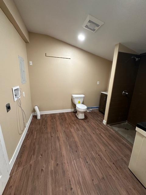 482 US Highway 12, Ortonville, MN 56278 - laundry area with wood finished floors, electric dryer hookup, hookup for a washing machine, and baseboards