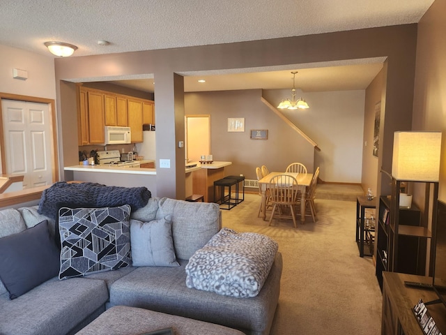 14494 Sumter Ave, Savage, MN 55378 - living room with a chandelier, light colored carpet, a textured ceiling, and baseboards