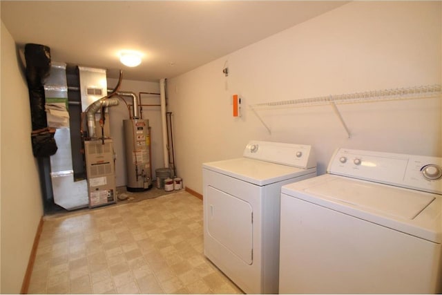 14494 Sumter Ave, Savage, MN 55378 - laundry room featuring water heater, separate washer and dryer, light flooring, and baseboards