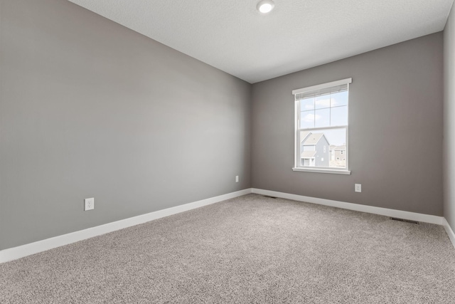 12678 Erskin St NE, Blaine, MN 55449 - carpeted spare room with baseboards