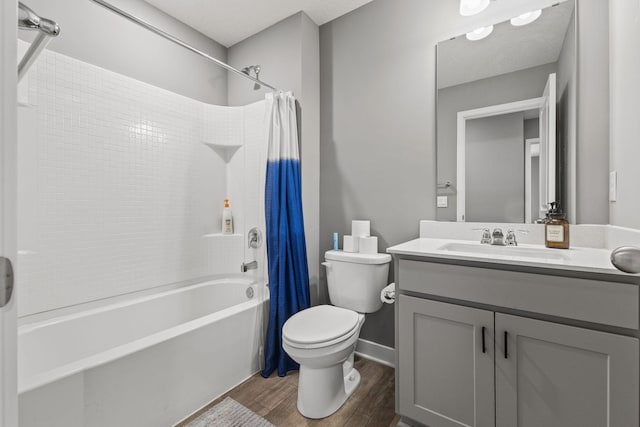 12678 Erskin St NE, Blaine, MN 55449 - bathroom with toilet, shower / bath combination with curtain, wood finished floors, and vanity