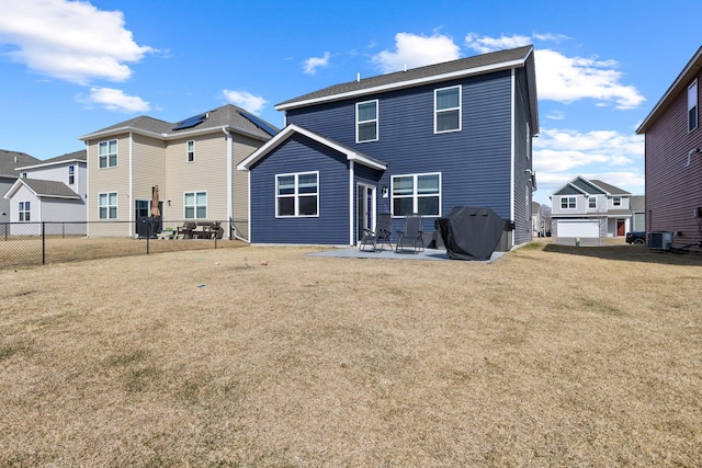 12678 Erskin St NE, Blaine, MN 55449 - back of house with cooling unit and a patio area