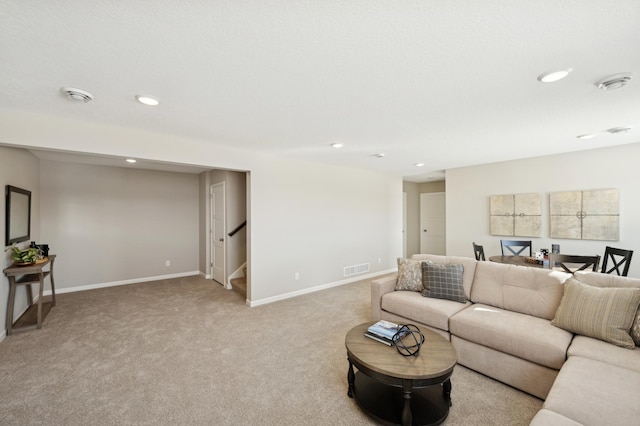 2615 Arbor Dr, Buffalo, MN 55313 - living area with baseboards, light carpet, recessed lighting, stairs, and visible vents