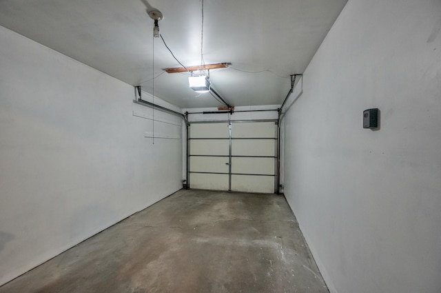 14831 Endicott Way Unit 315, Apple Valley, MN 55124 - garage featuring a garage door opener