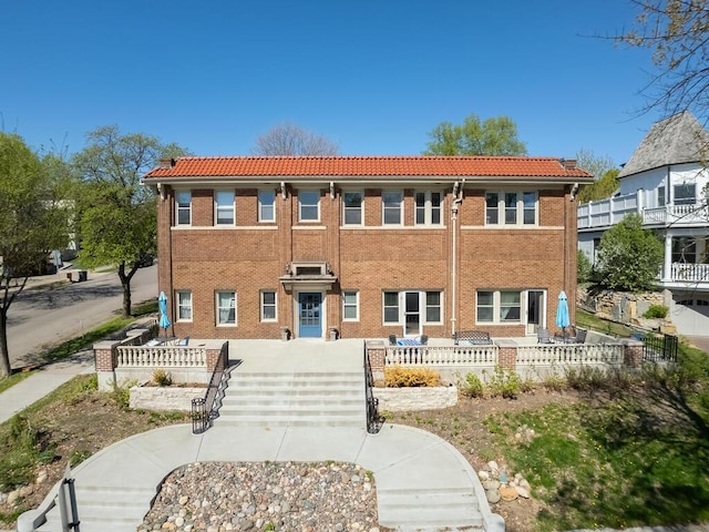 4136 Queen Ave S Unit 108, Minneapolis, MN 55410 - view of front of house with a tiled roof and brick siding