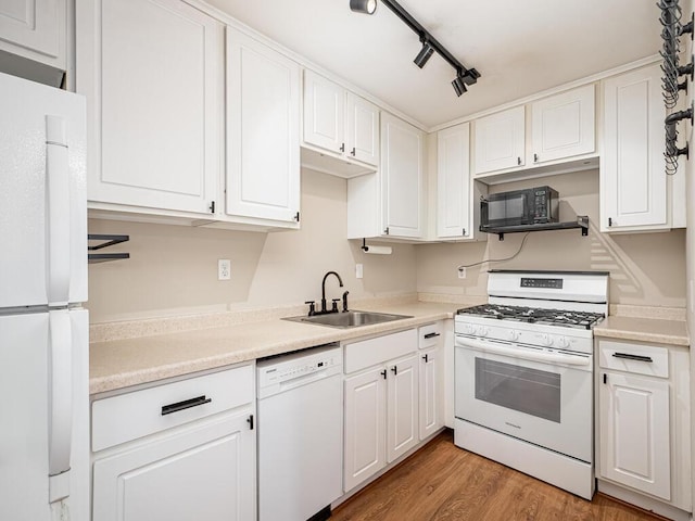 4136 Queen Ave S Unit 108, Minneapolis, MN 55410 - kitchen with white appliances, a sink, white cabinetry, light wood-style flooring, and light countertops