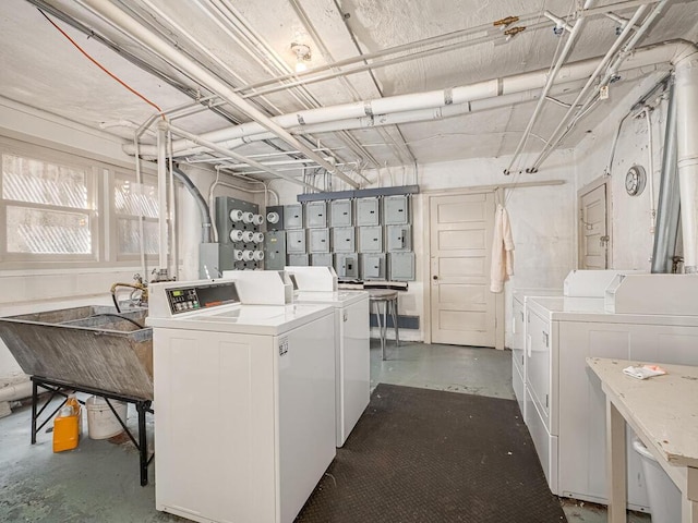 4136 Queen Ave S Unit 108, Minneapolis, MN 55410 - washroom with independent washer and dryer and a sink