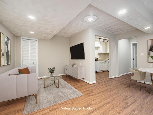 4136 Queen Ave S Unit 108, Minneapolis, MN 55410 - living area with light wood-style flooring and recessed lighting