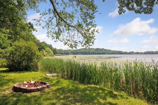4963 Crofoot Ave NW, Buffalo, MN 55313 - view of green lawn featuring a fire pit