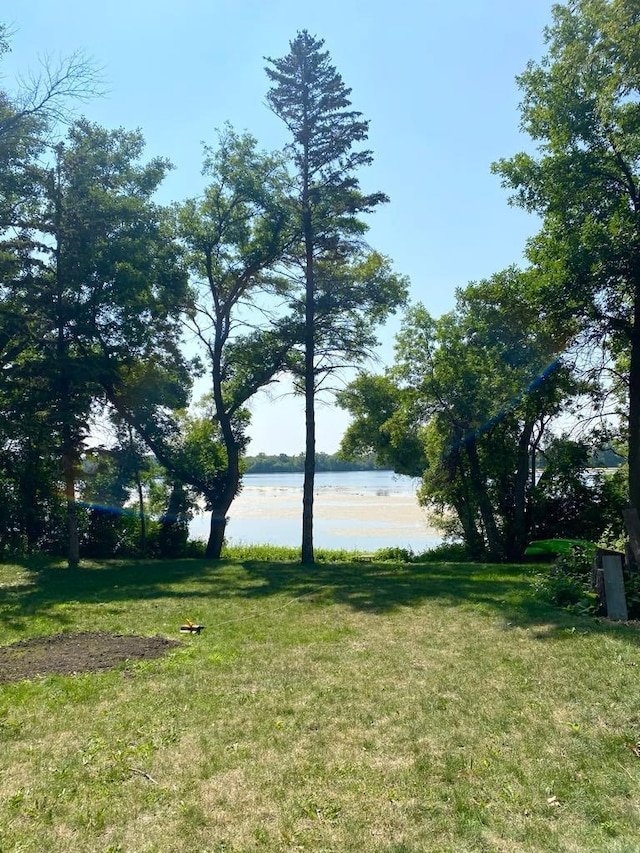 view of yard with a water view