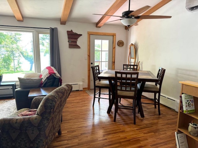 dining space featuring baseboard heating, a wall mounted AC, beamed ceiling, and wood finished floors
