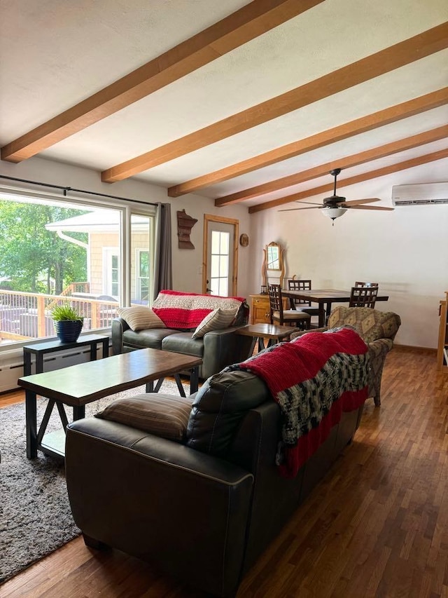 living room featuring beam ceiling, ceiling fan, wood finished floors, and an AC wall unit