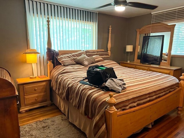 bedroom with wood finished floors and ceiling fan