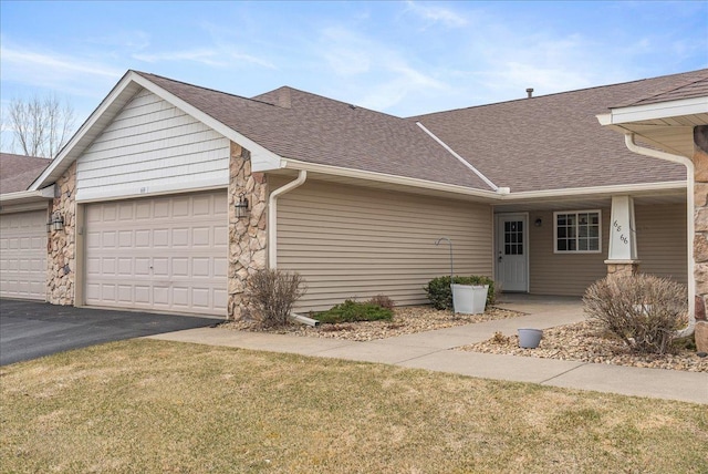 68 Crown Pointe Curv, Hudson, WI 54016 - single story home with a front yard, roof with shingles, an attached garage, and aphalt driveway
