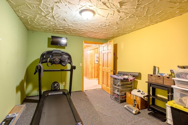 workout area with carpet floors