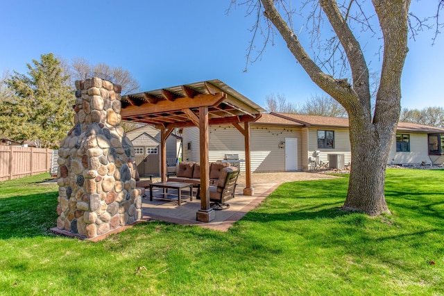 exterior space with fence, an outdoor living space, and a patio area