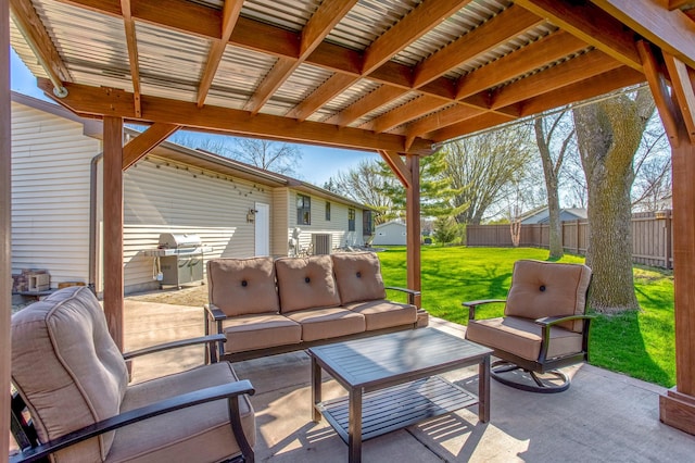 view of patio / terrace featuring an outdoor hangout area, fence, and a grill