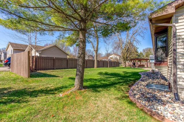 view of yard with a fenced backyard