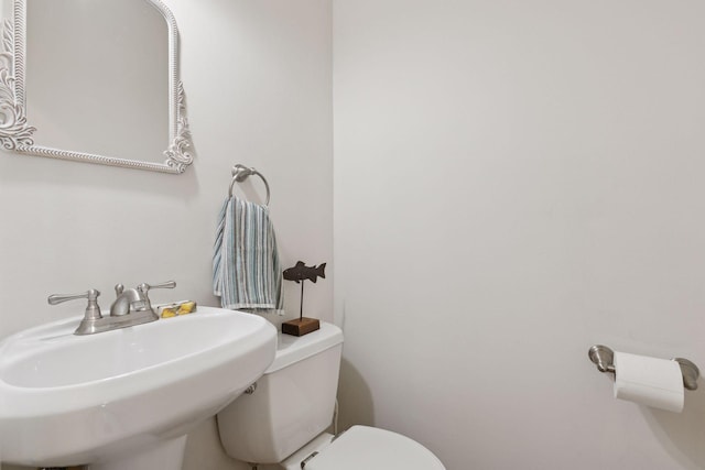 bathroom with a sink and toilet