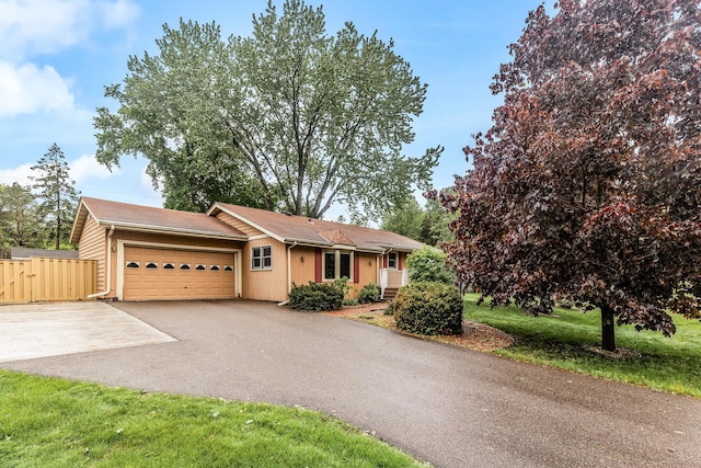 722 Navajo Ln, Mendota Heights, MN 55120 - ranch-style house featuring an attached garage, asphalt driveway, a gate, and roof with shingles