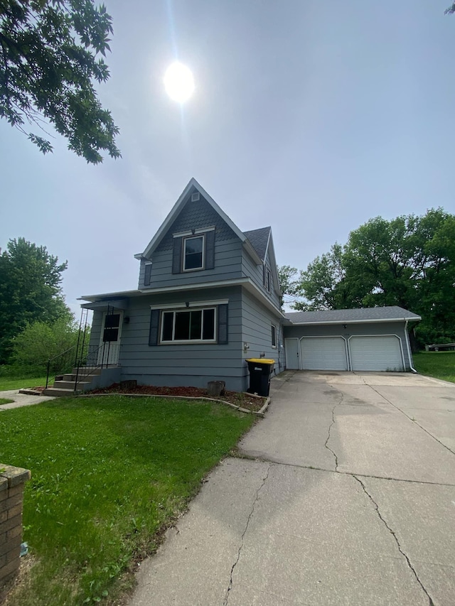 104 3rd St, Buffalo Lake, MN 55314 - view of front of home with a front yard and a garage