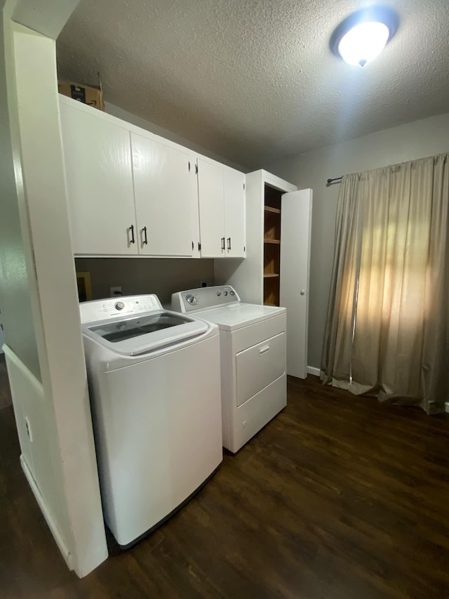 104 3rd St, Buffalo Lake, MN 55314 - laundry area with cabinet space, dark wood-style flooring, separate washer and dryer, and a textured ceiling