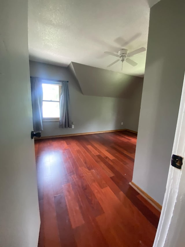 104 3rd St, Buffalo Lake, MN 55314 - bonus room featuring ceiling fan, lofted ceiling, wood finished floors, and baseboards