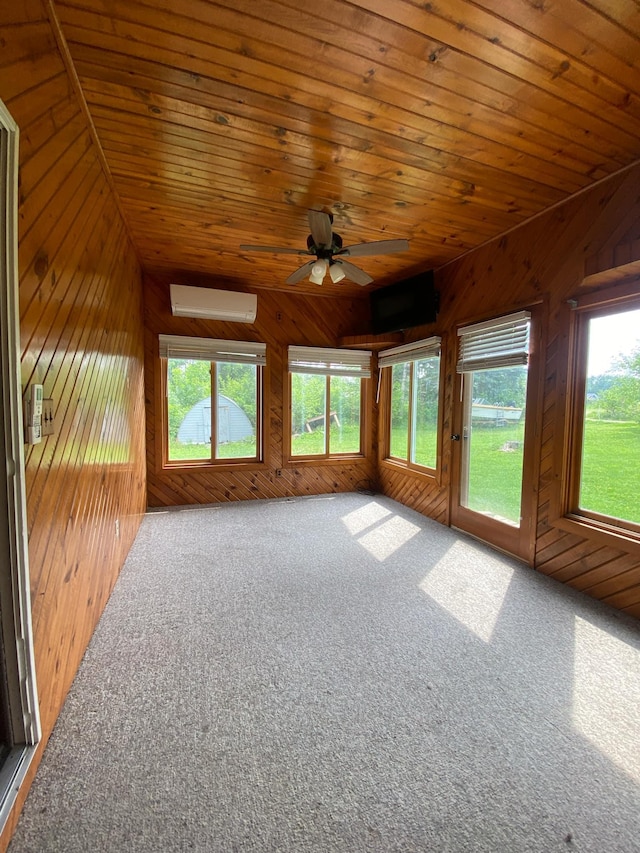 104 3rd St, Buffalo Lake, MN 55314 - unfurnished sunroom featuring a wall mounted AC, vaulted ceiling, wooden walls, carpet flooring, and wooden ceiling