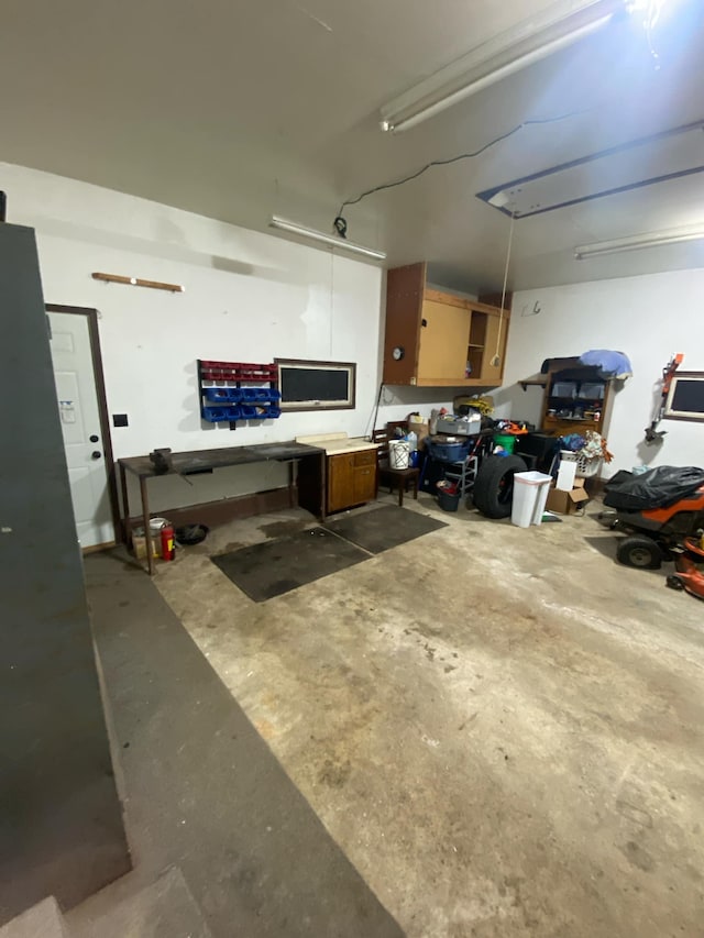 104 3rd St, Buffalo Lake, MN 55314 - garage featuring a workshop area