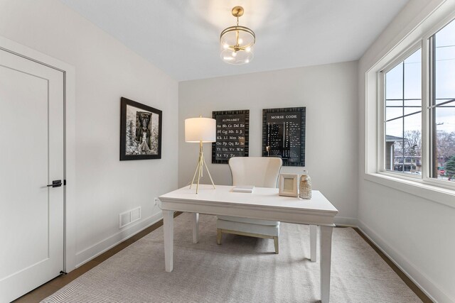 5012 Hankerson Ave, Edina, MN 55436 - home office featuring healthy amount of natural light and a chandelier