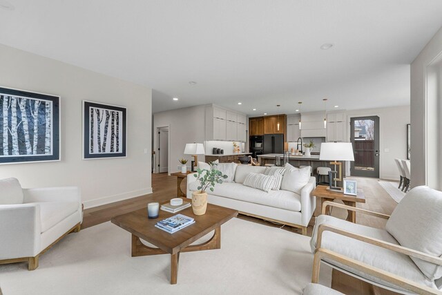 5012 Hankerson Ave, Edina, MN 55436 - living area featuring light wood-style floors and recessed lighting
