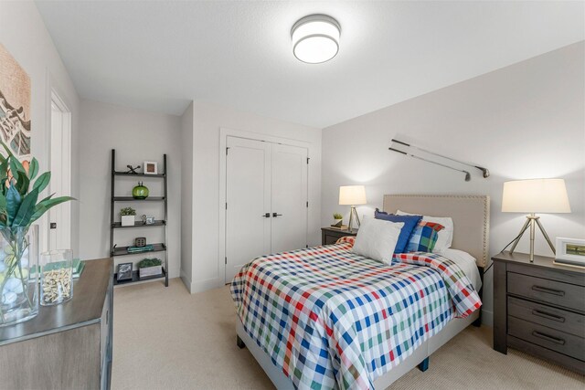 5012 Hankerson Ave, Edina, MN 55436 - bedroom featuring light colored carpet and a closet