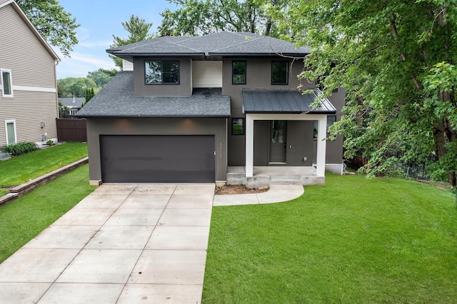 5012 Hankerson Ave, Edina, MN 55436 - view of front of home with roof with shingles, an attached garage, concrete driveway, and stucco siding