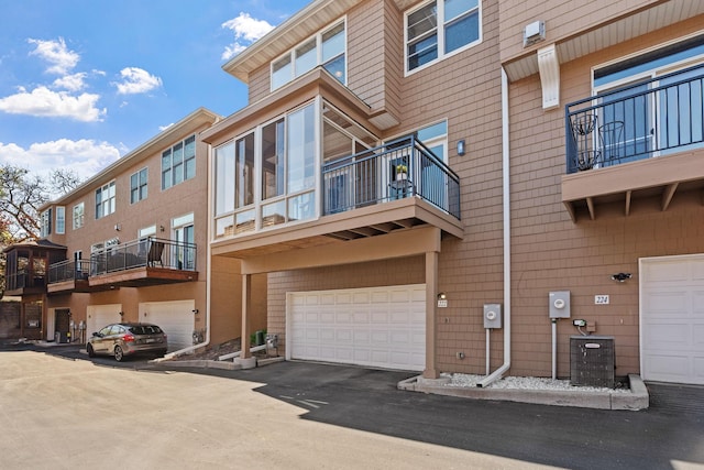 222 Ridgewood Ave, Minneapolis, MN 55403 - back of property with a balcony and an attached garage