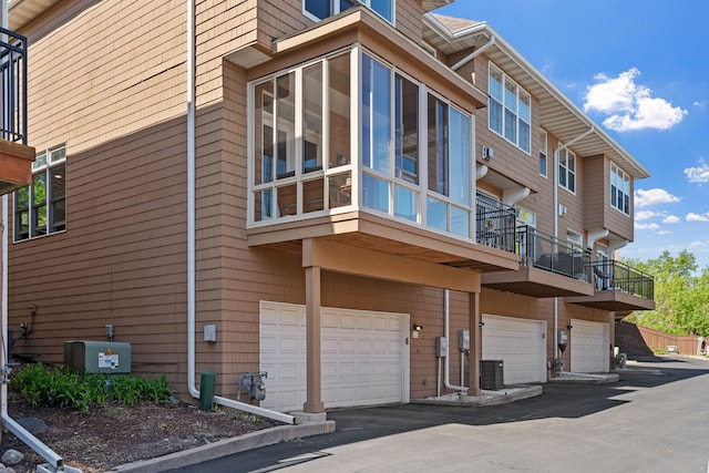 222 Ridgewood Ave, Minneapolis, MN 55403 - view of building exterior featuring an attached garage